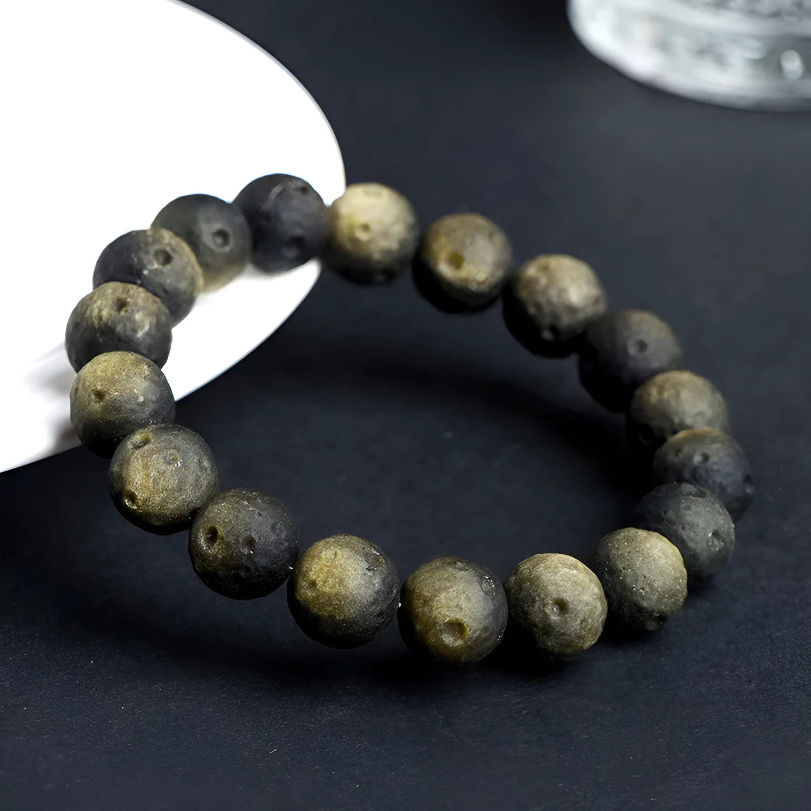 Natural obsidian crater ball bracelet with textured beads in silver meteorite finish
