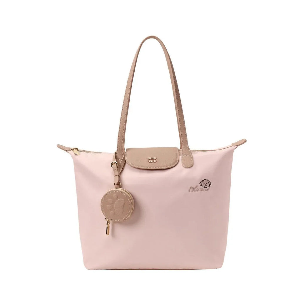 Women's large beige tote shoulder bag with external pockets and a horizontal square shape.