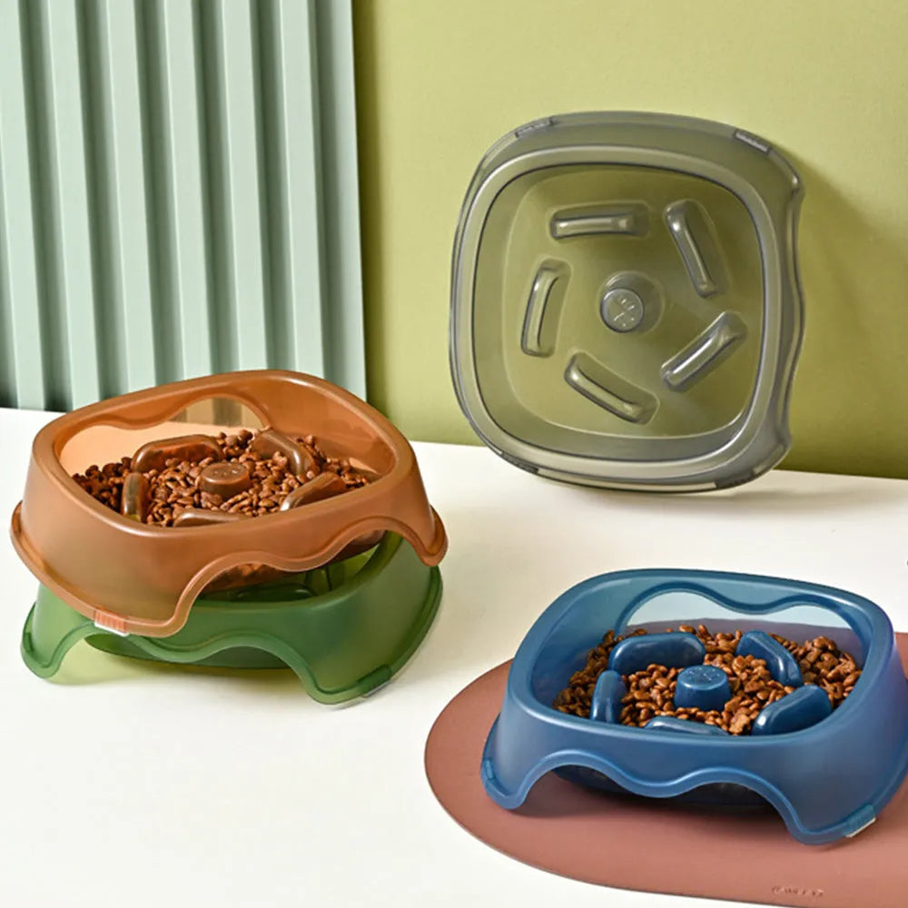 Blue plastic dog slow feeder bowl with interior ridges to control eating speed