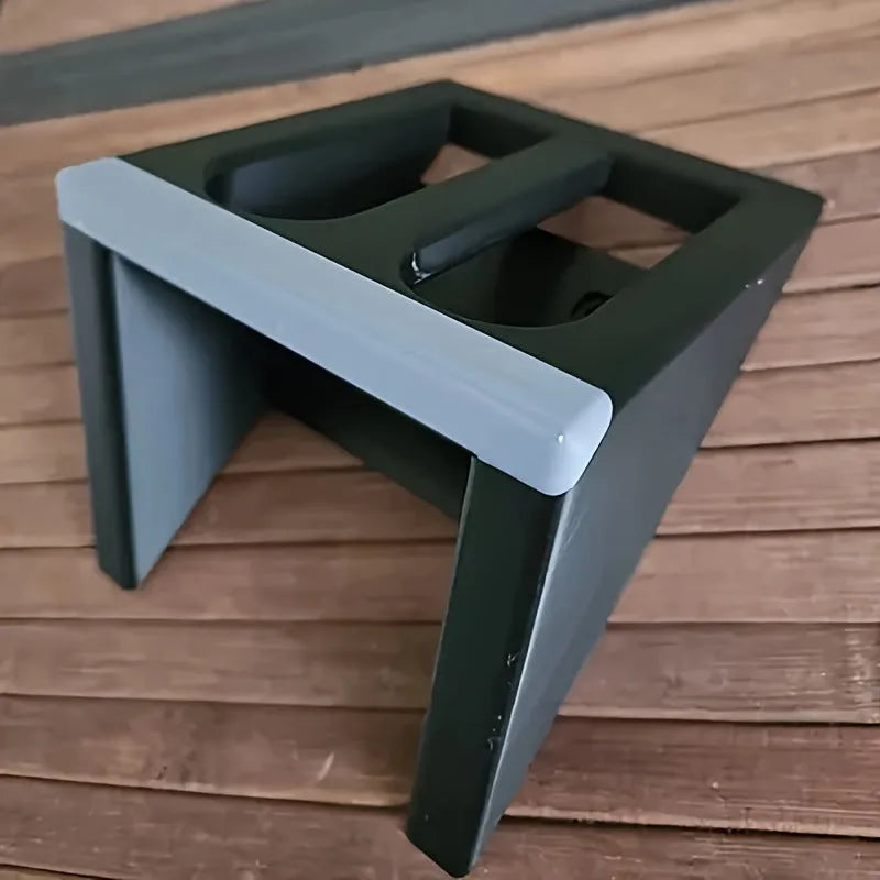 Black plastic pistol display stand for model firearms measuring 10.85 by 7.6 centimetres