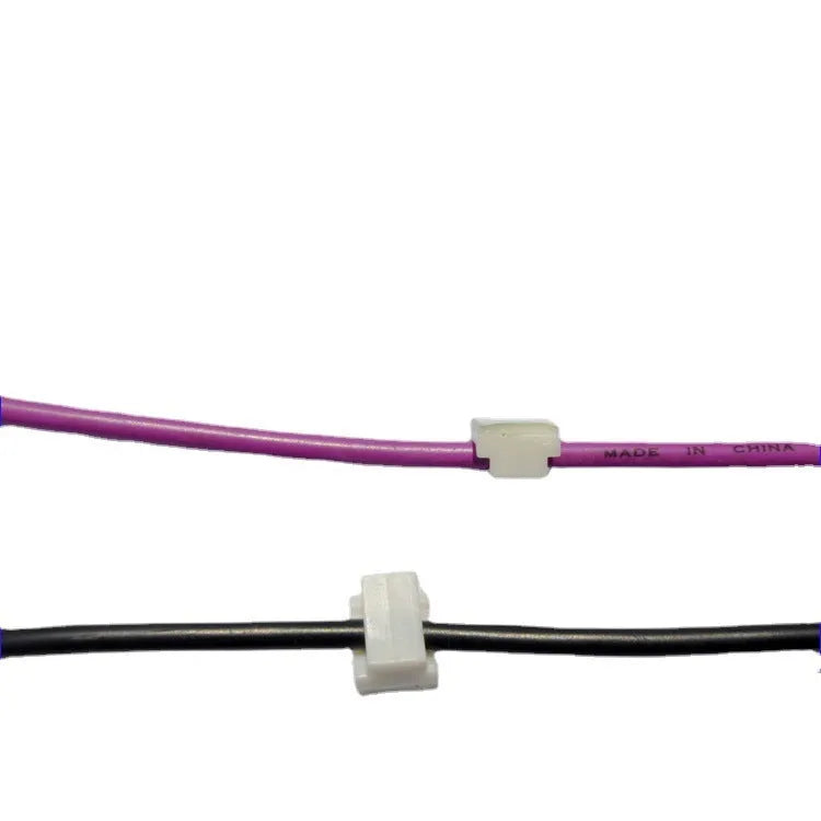 Black plastic automotive wire management clip for car cable routing and LED installations