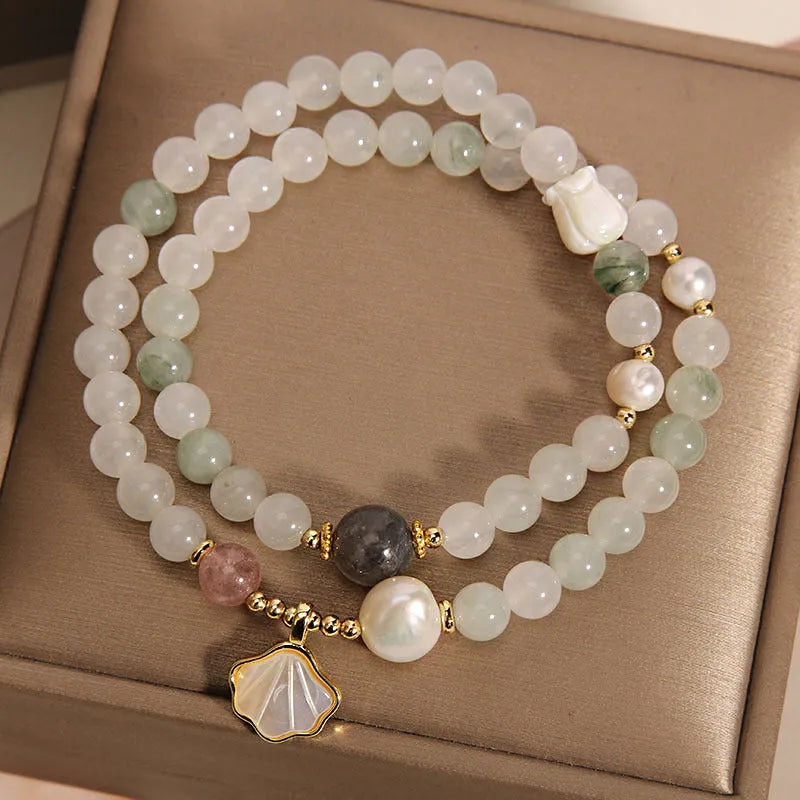 Women's crystal bracelet with Tianshan jade ginkgo leaf pendant and gold-plated gemstone settings