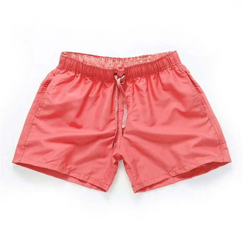 Men's straight leg beach shorts in polyester fabric for surfing and swimming