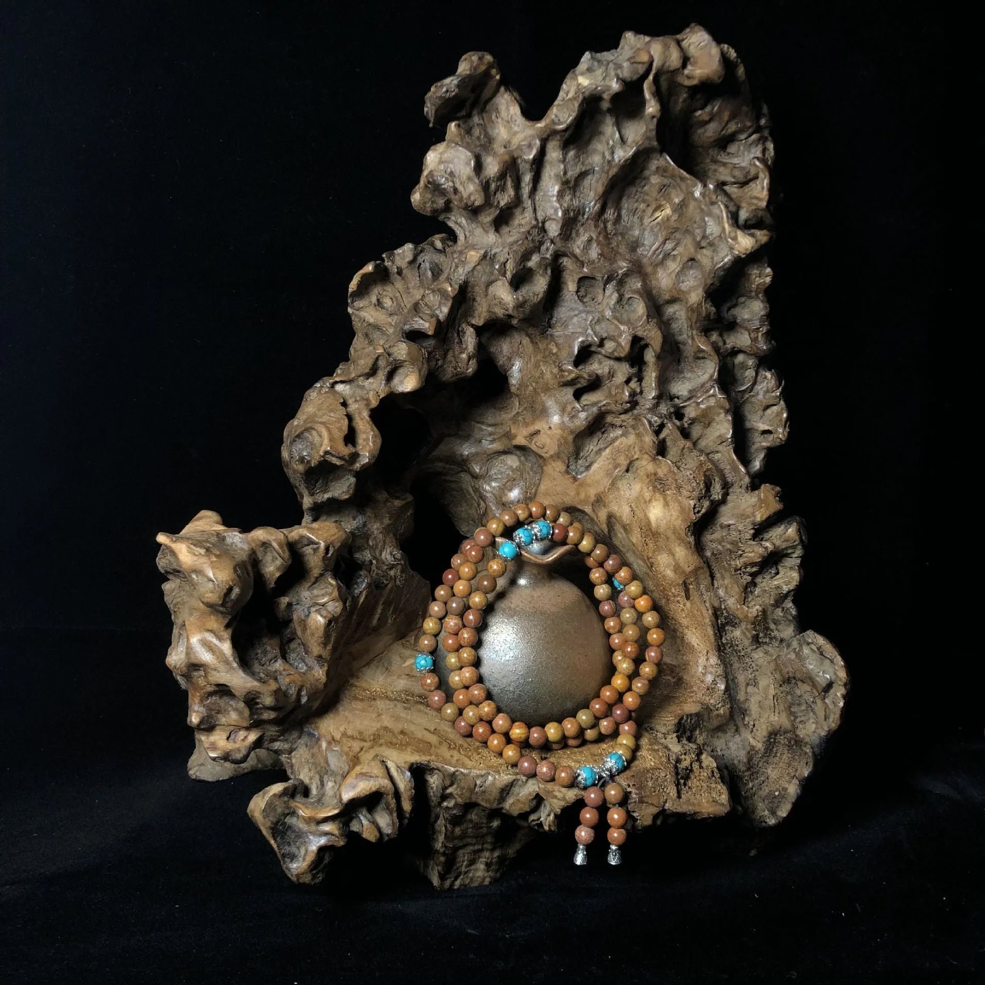 Stone bead bracelet with 108 geometric beads measuring 5-6mm in diameter