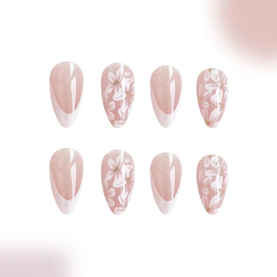 C625 short glossy almond fake nails with French manicure, glitter, and pink powder flowers.