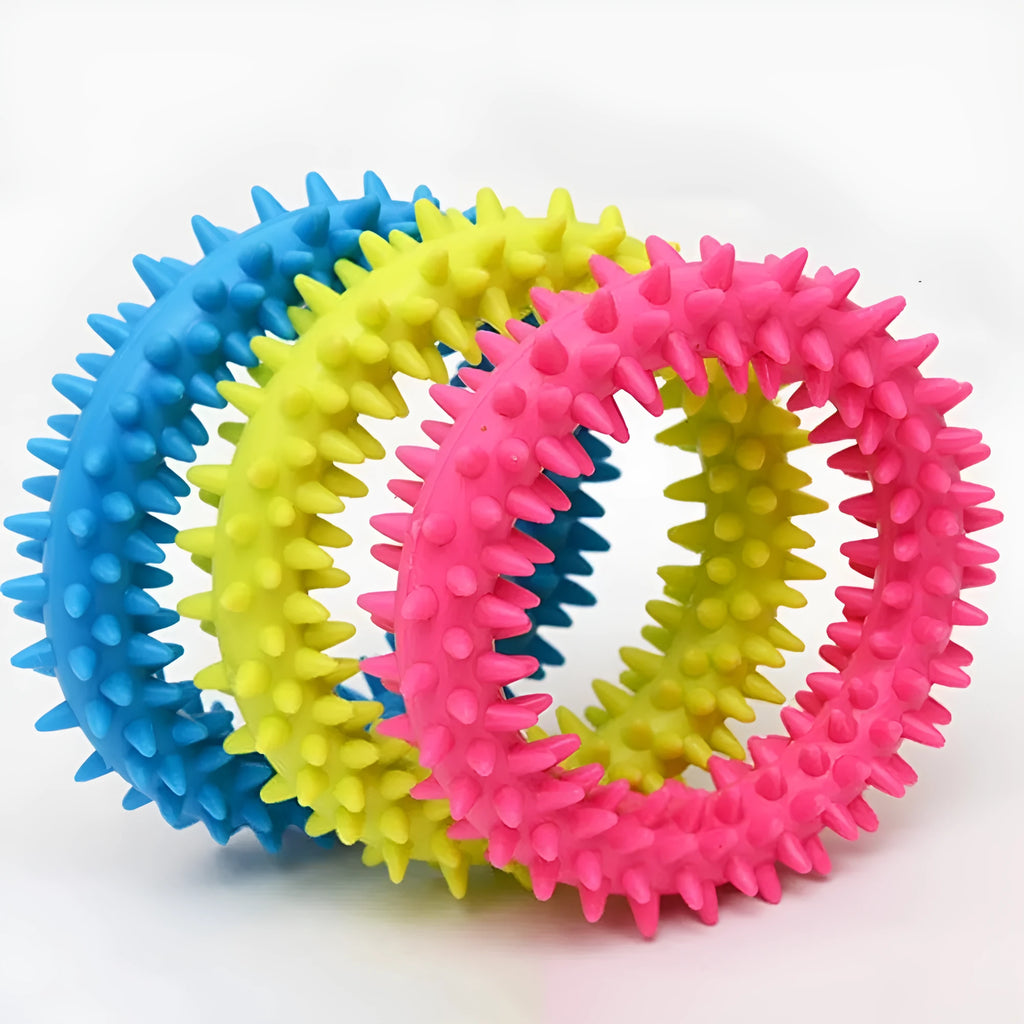 Blue spiky TPR ring dog chew toy for dental cleaning on a white background