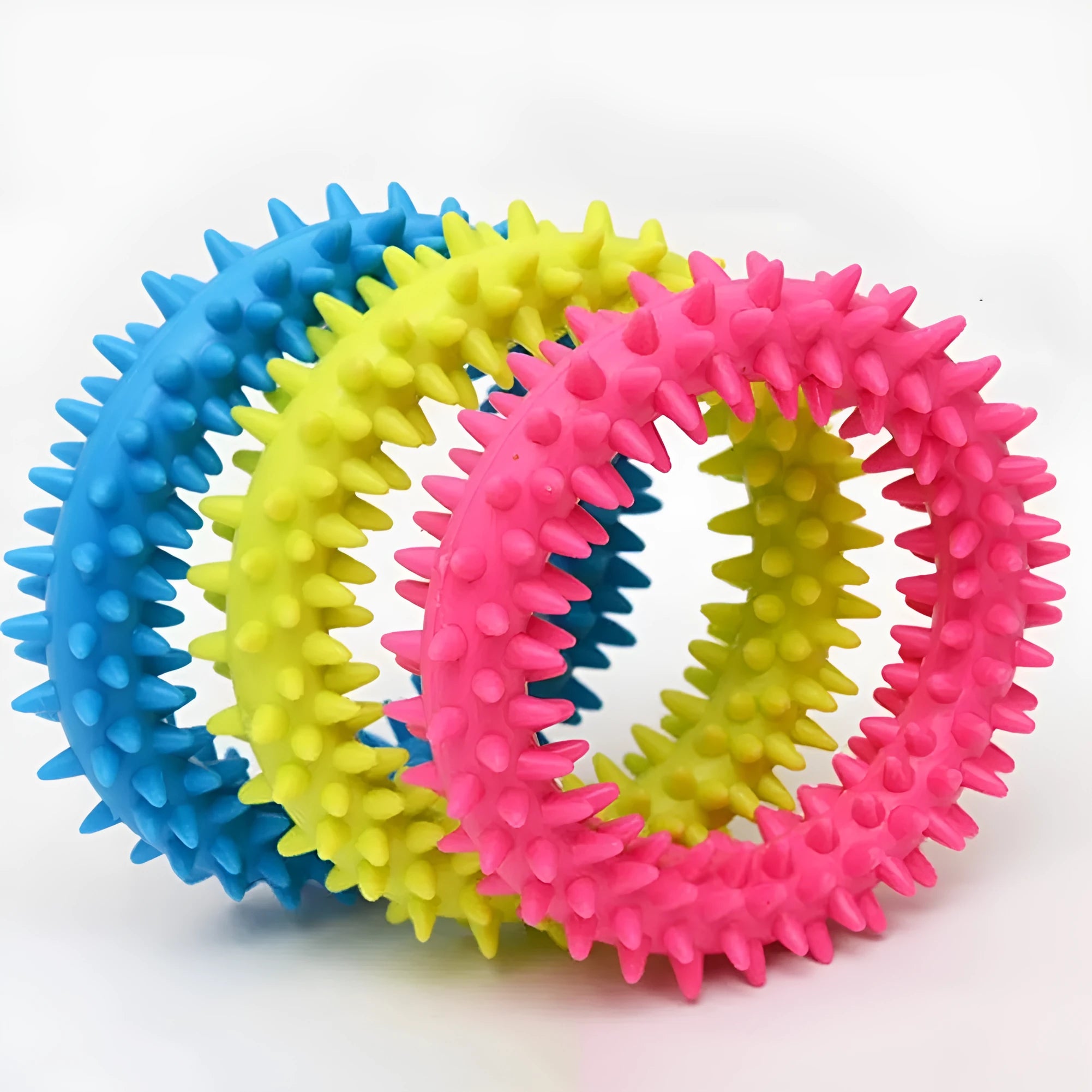 Blue spiky TPR ring dog chew toy for dental cleaning on a white background