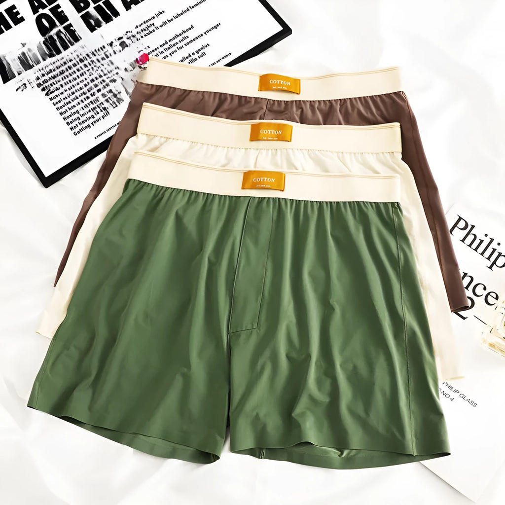 Men's solid colour loose ice silk underwear in a multi-pack.