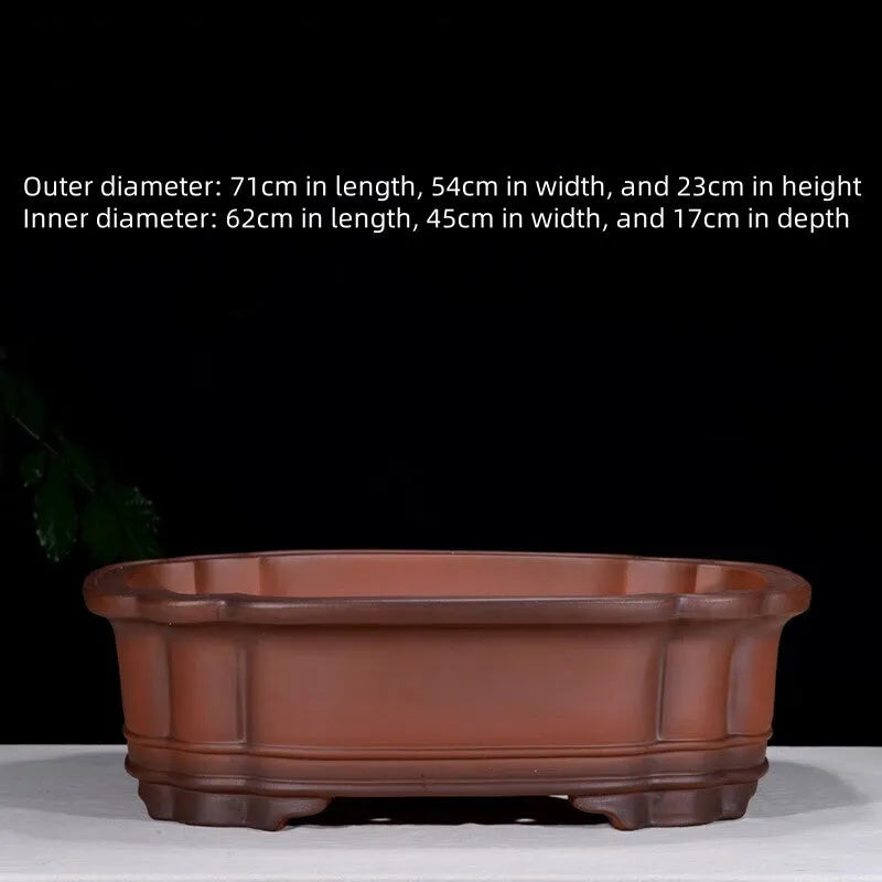 Large antique-finished Chinese purple clay flowerpot measuring 71cm long