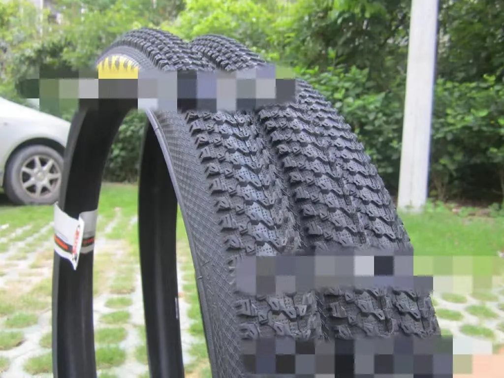 Mountain bike ultralight puncture-proof tyre shown in multiple sizes for 26, 27.5, and 29-inch wheels