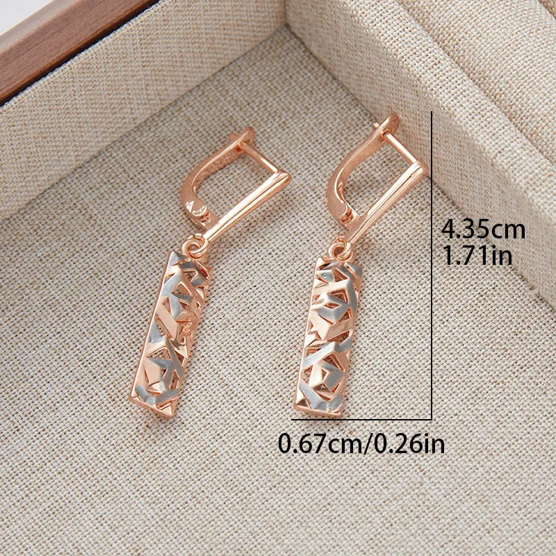 Rectangular hollow stud earrings with a two-tone picture style finish.