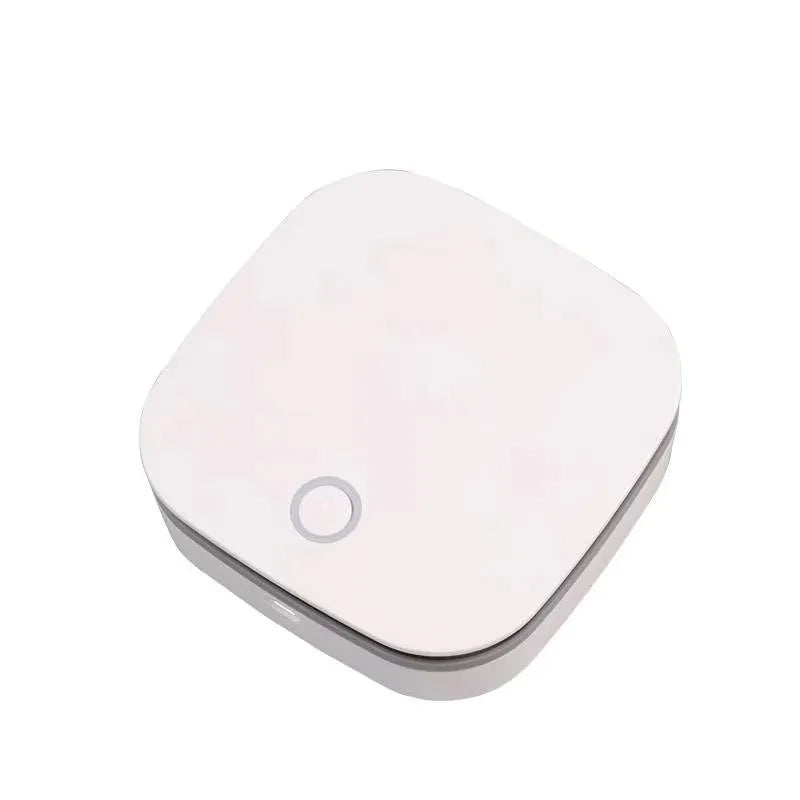 White USB-powered air purifier with button control for car and small room use.
