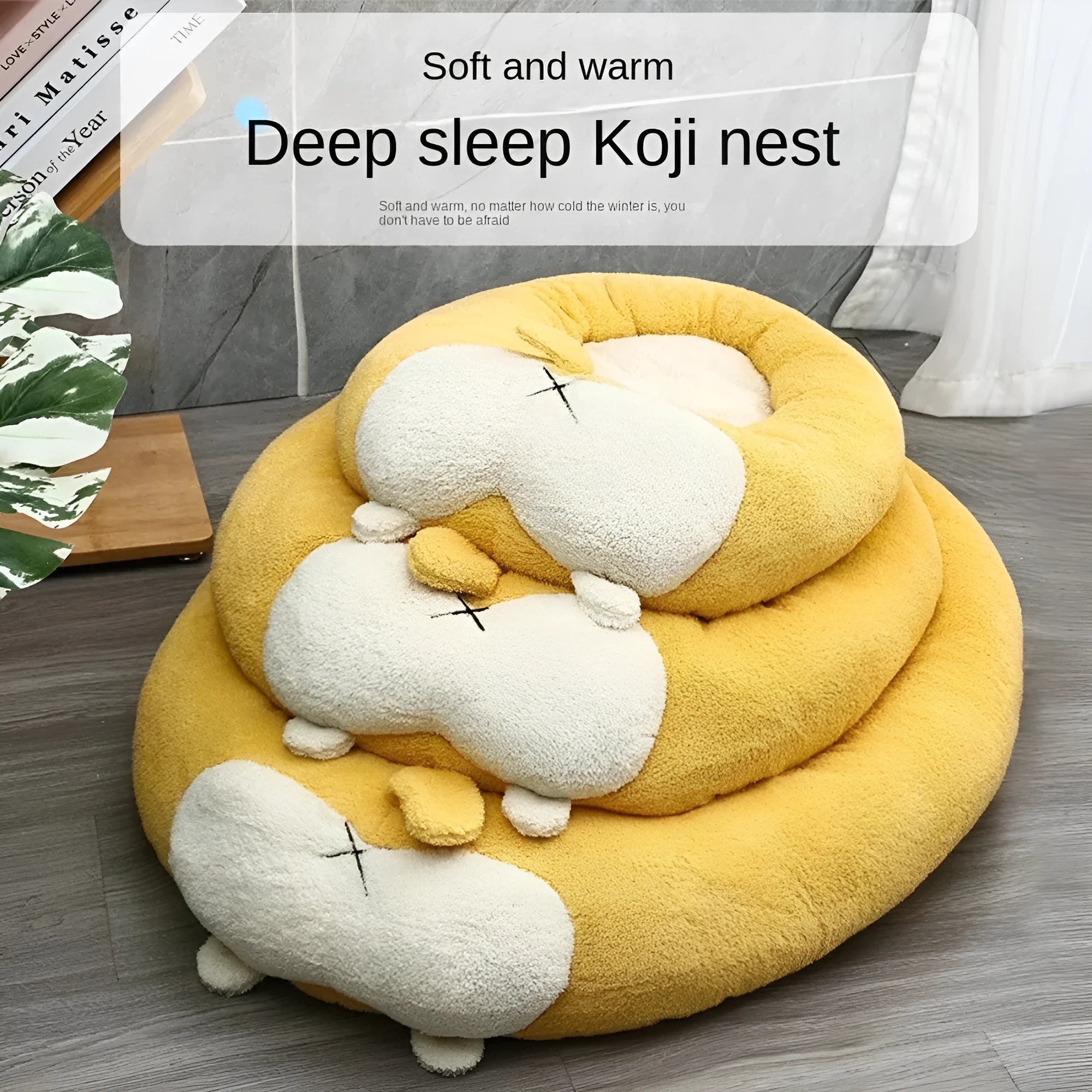 Corgi-shaped plush pet bed for dogs and cats in grey, shown in a home setting.
