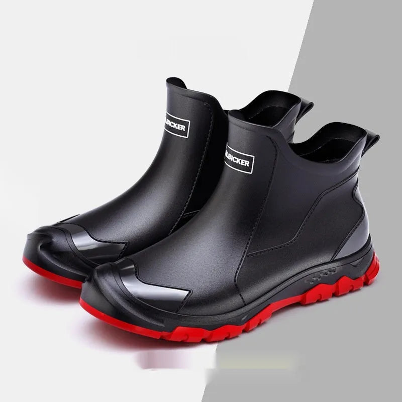 Pair of solid colour low tube PVC wading shoes with a round toe and non-slip plastic sole.