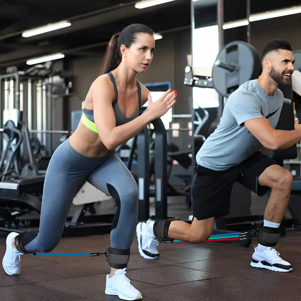 TPE leg resistance band set with three tension levels, foot loops, and storage bag for yoga hip lifting exercises