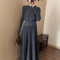 Dark grey knitted long dress suit with 3D texture, featuring a sweater and skirt in artistic retro style.