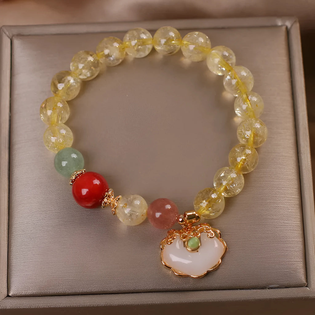 Women's pendant bracelet with natural citrine jade ruyi charm in yellow hair crystal colour