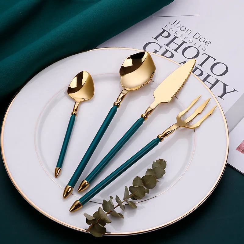 Stainless steel 4-piece cutlery set with knife fork and two spoons in a solid colour finish