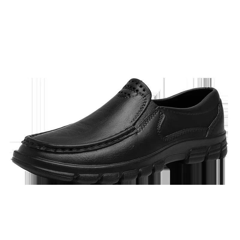 Men's black slip-on work shoes with waterproof platform sole and round toe design