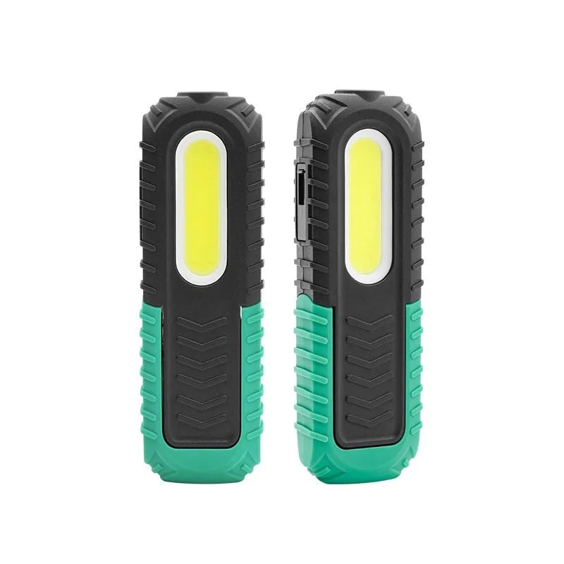 Black and green USB auto repair work light with compact design for workshop use