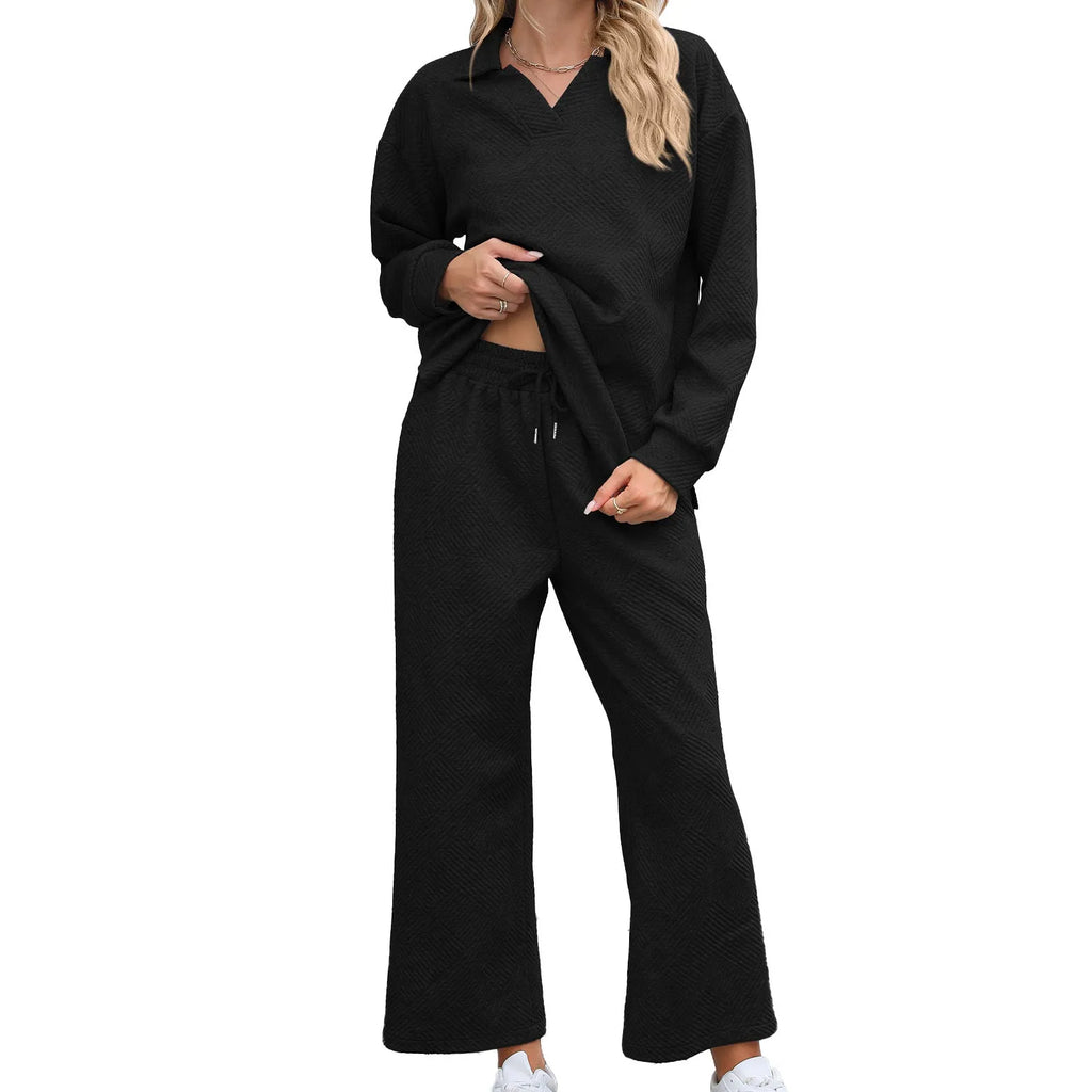Women's solid colour knitted rayon suit set with long sleeve top and elastic waist cropped pants.