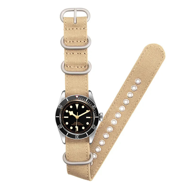 Canvas nylon thickened watch band with silver buckle in army green colour on a white background showing weave texture