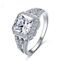 Women's geometric hollow zircon ring in platinum colour showing quadrilateral design and inlaid stones