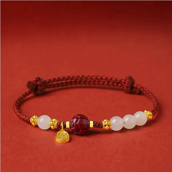 Hetian Jade Cinnabar Red Rope Women's Bracelet made of 925 silver with an adjustable chain.
