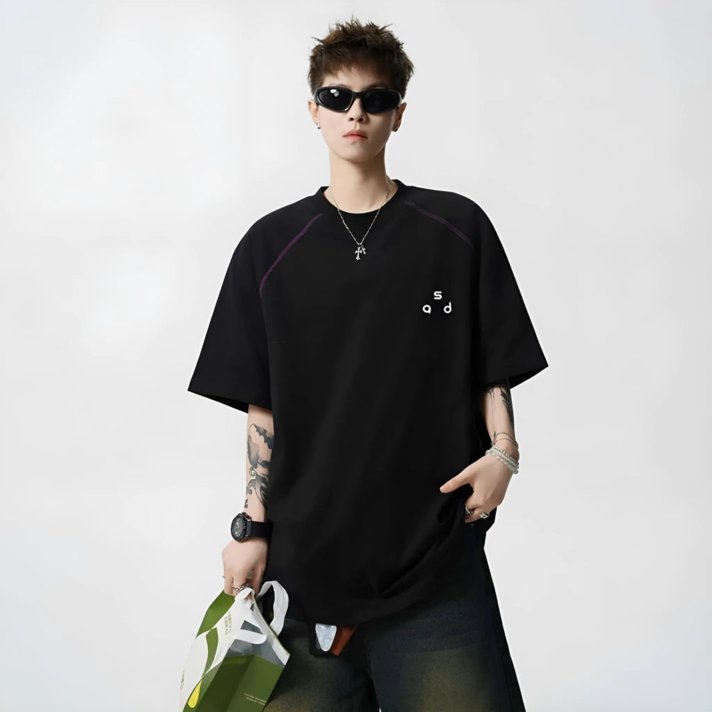 Cotton loose fit short-sleeve T-shirt with letter print on front, shown in black colour