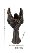 Dark Angel resin statue ornament measuring 17cm tall on display shelf.