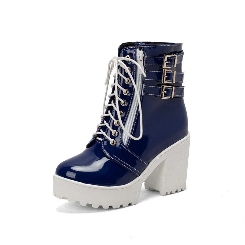 Women's black thick-heel short boots with front lace-up and round toe on a waterproof rubber sole.