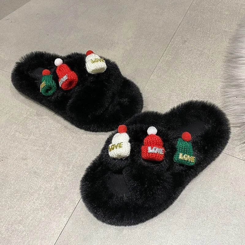 Women's Christmas slippers with a red and white hat decoration on the front, made from hairy plush fabric.
