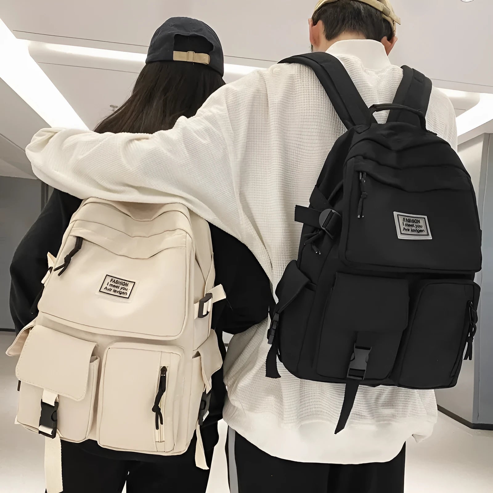 Black student backpack with three-dimensional pockets showing computer compartment