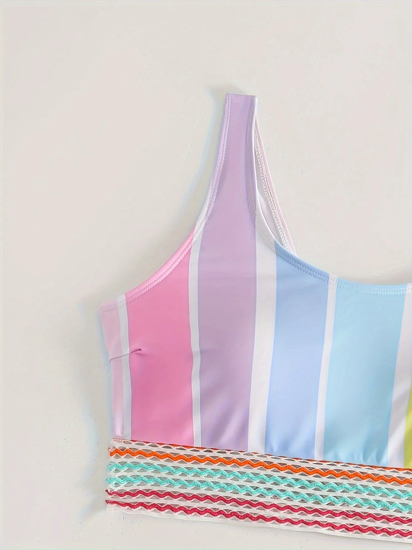 Women's striped sport bikini set with briefs style top and pants for swimming.