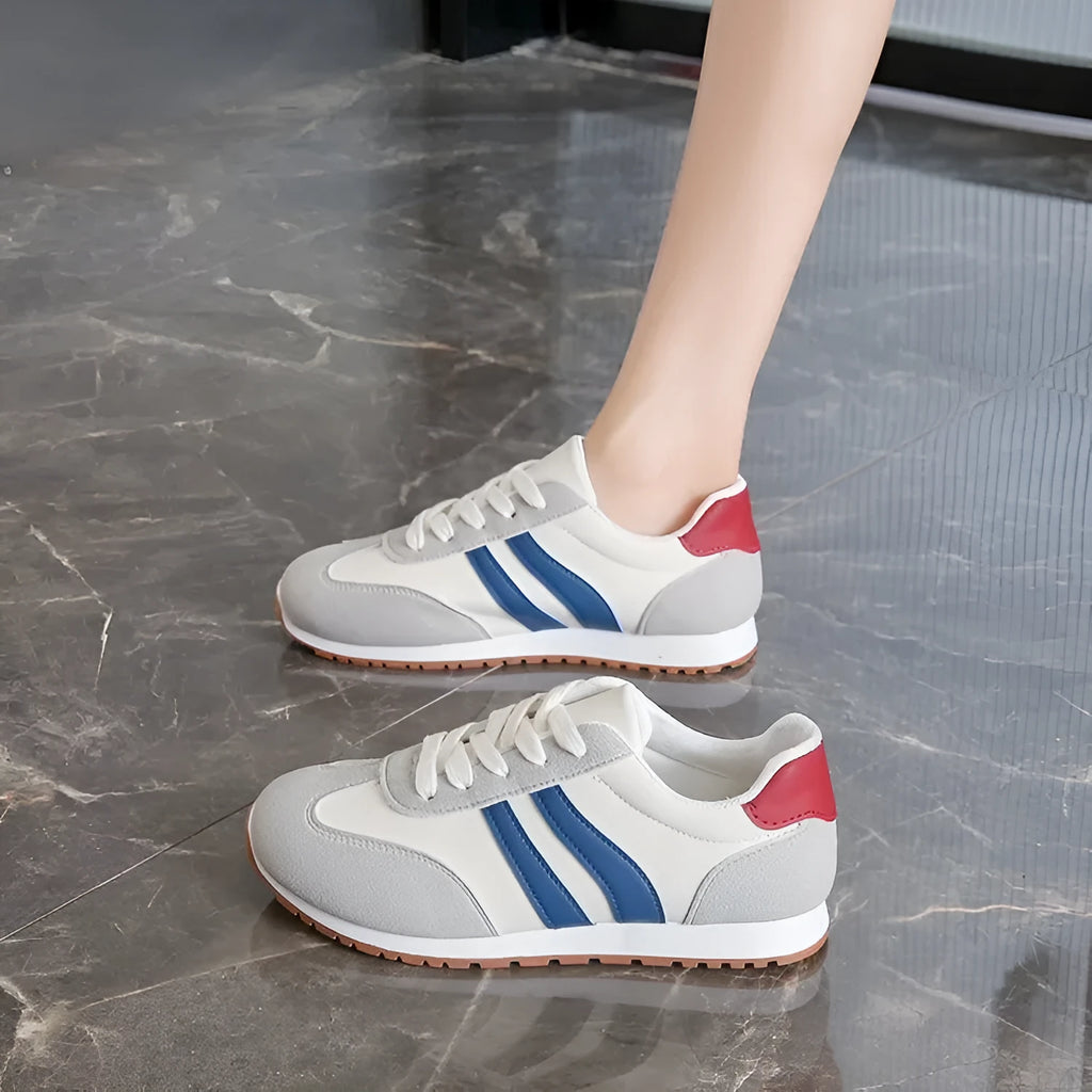 Blue and grey Cortez stripes leisure sports shoes with rubber sole and round toe.