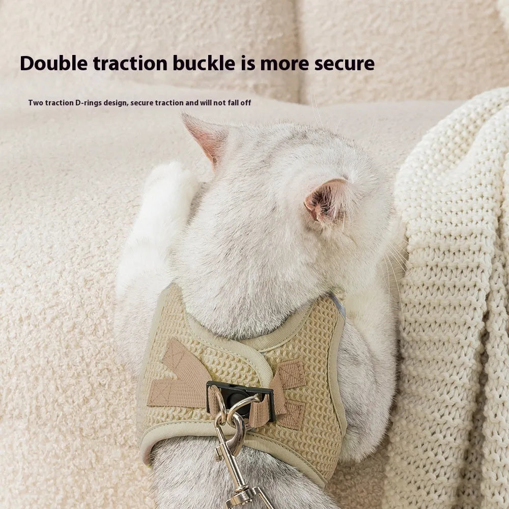 Brown waffle cloth cat harness with pulling rope chest strap shown on feline