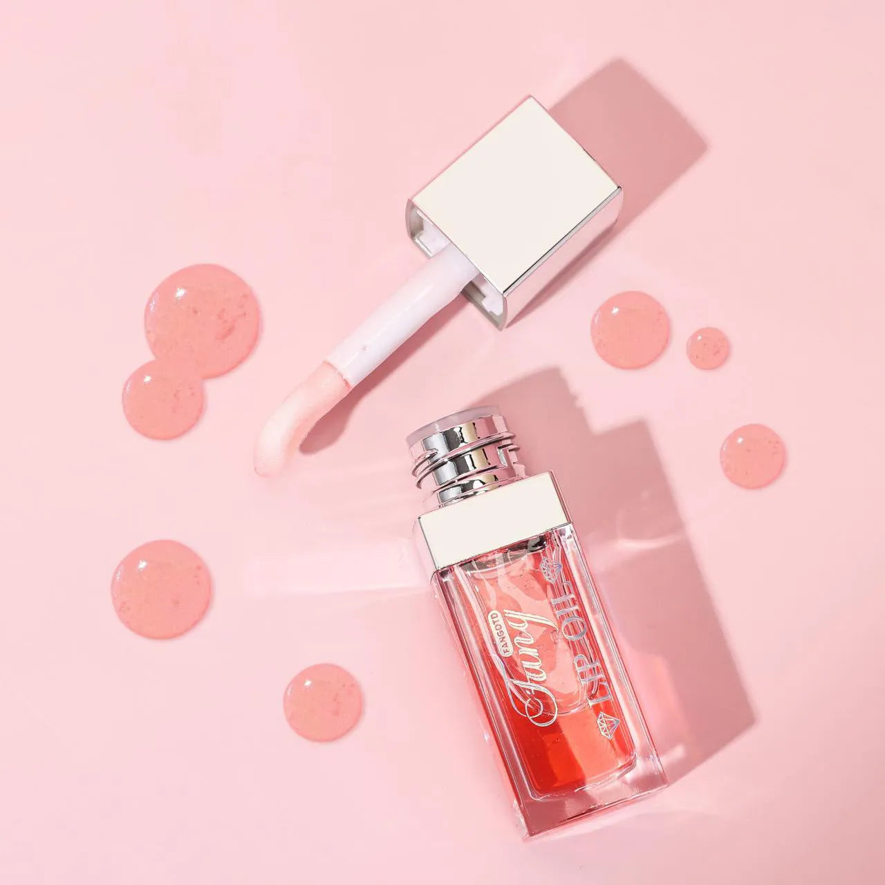 Five colour options of a bright mint lip gloss lipstick with moisturising lip essence oil.