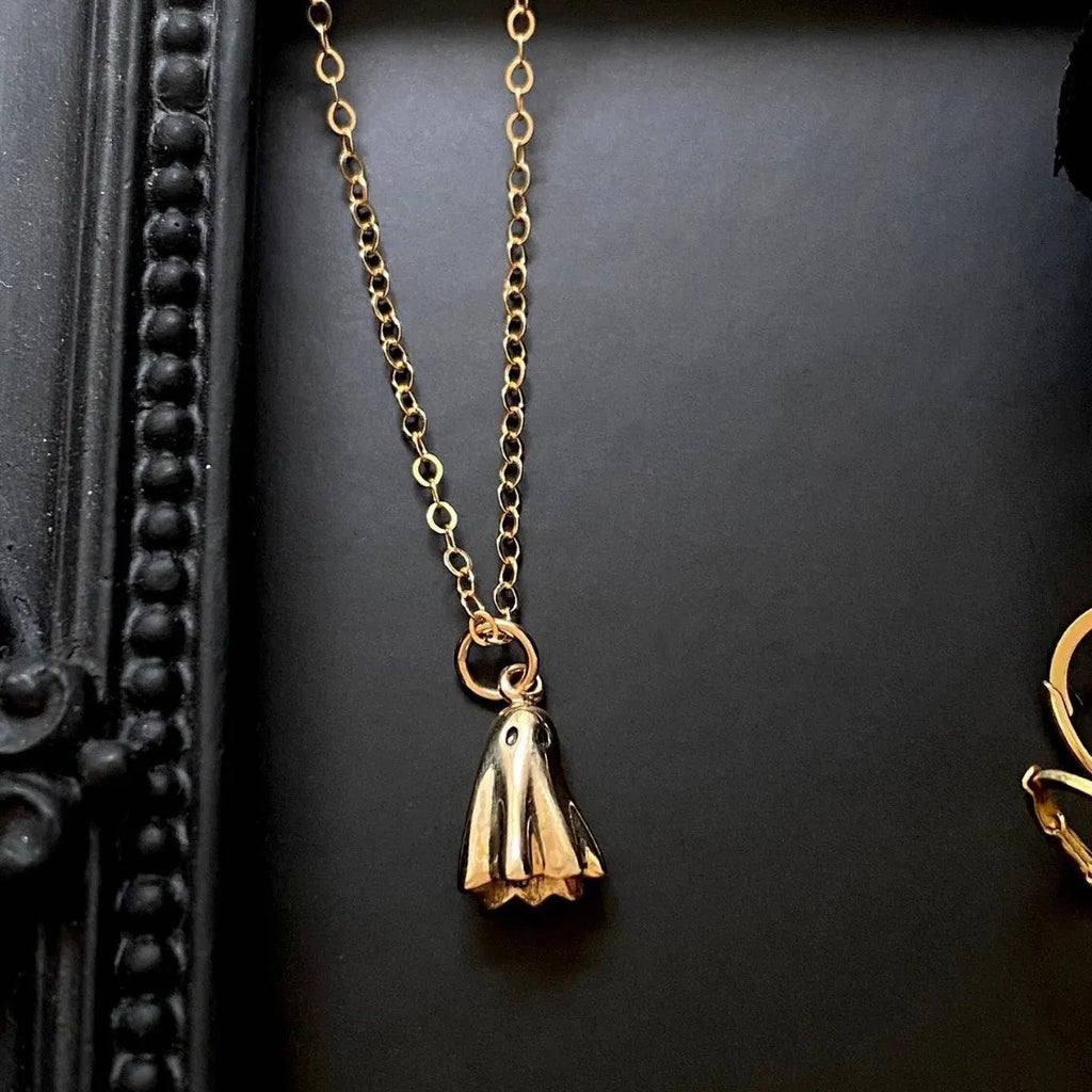 Ghost pendant necklace on twisted stainless steel chain with titanium steel detail