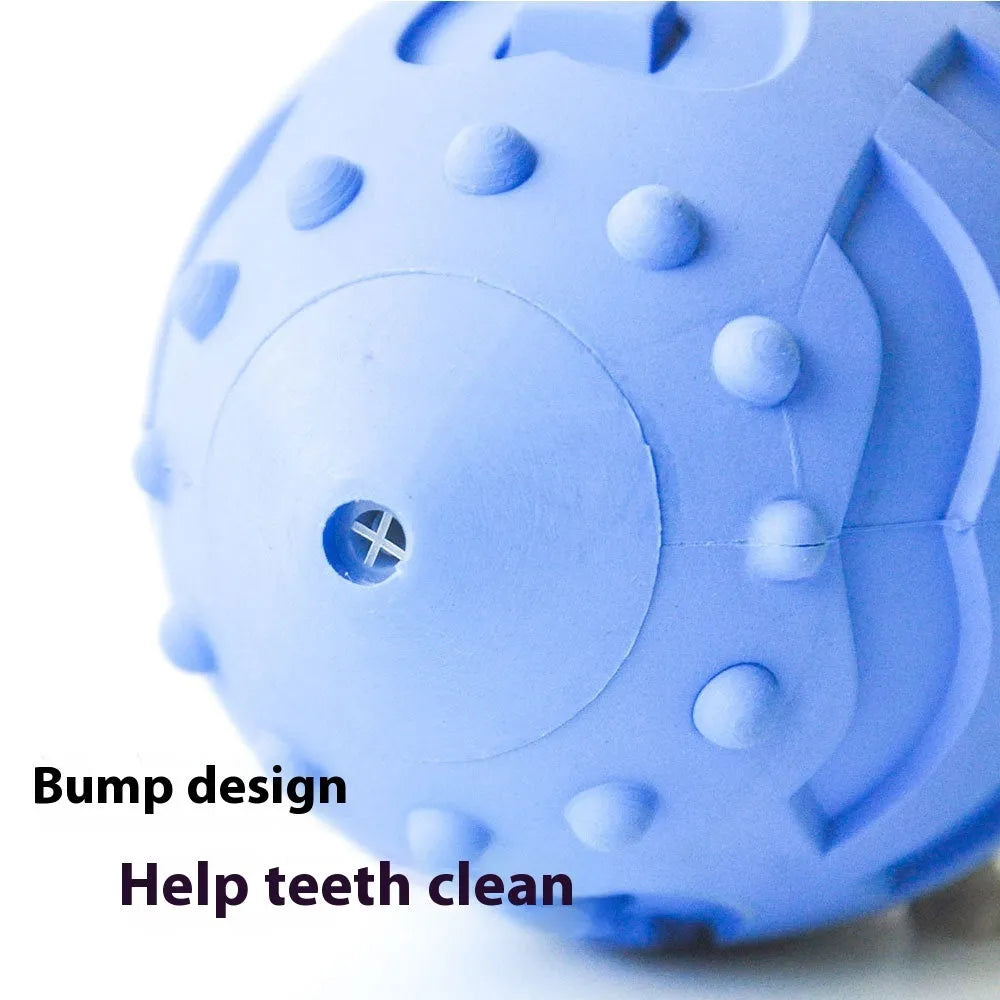 Light green rubber rugby ball dog toy with textured teeth cleaning surface
