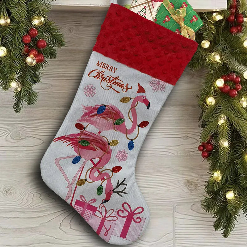 Flamingo patterned cloth Christmas stocking decoration measuring 46 by 28 centimetres.