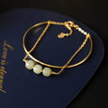 Jade lucky beads bracelet for women with gold inlay detailing showing single, double and three beads versions