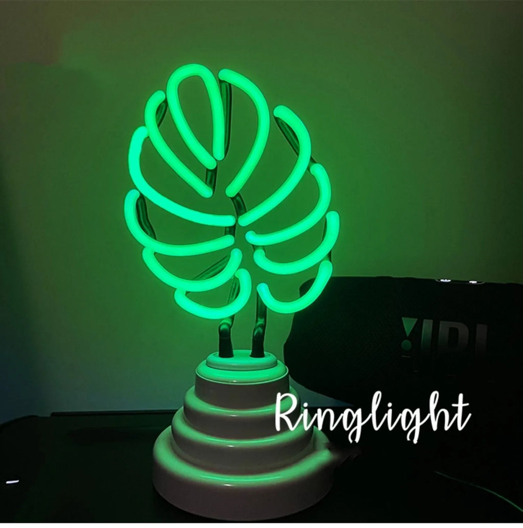 White minimalist bamboo-shaped desk lamp with green light, USB cable, shown in two size options.