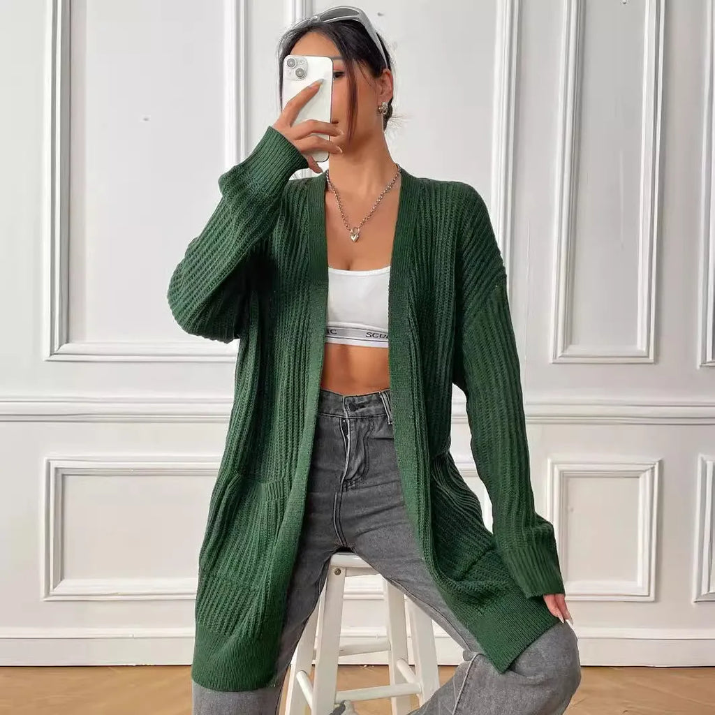 Women's mid-length loose-fit acrylic cardigan in dark green, shown as a single piece with long sleeves.