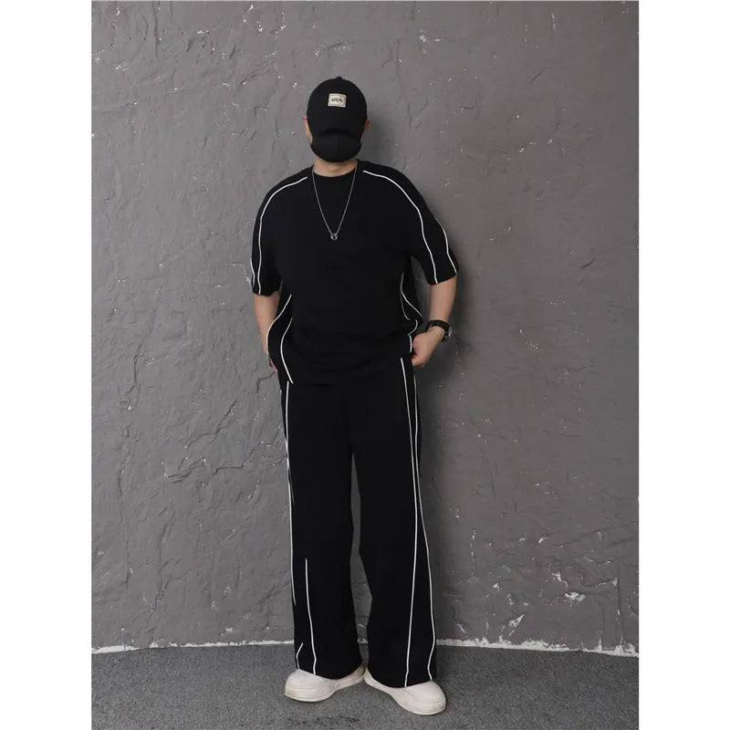 Summer women's sporty casual two-piece set in black suit with colour-blocking trim, short sleeve top and long pants