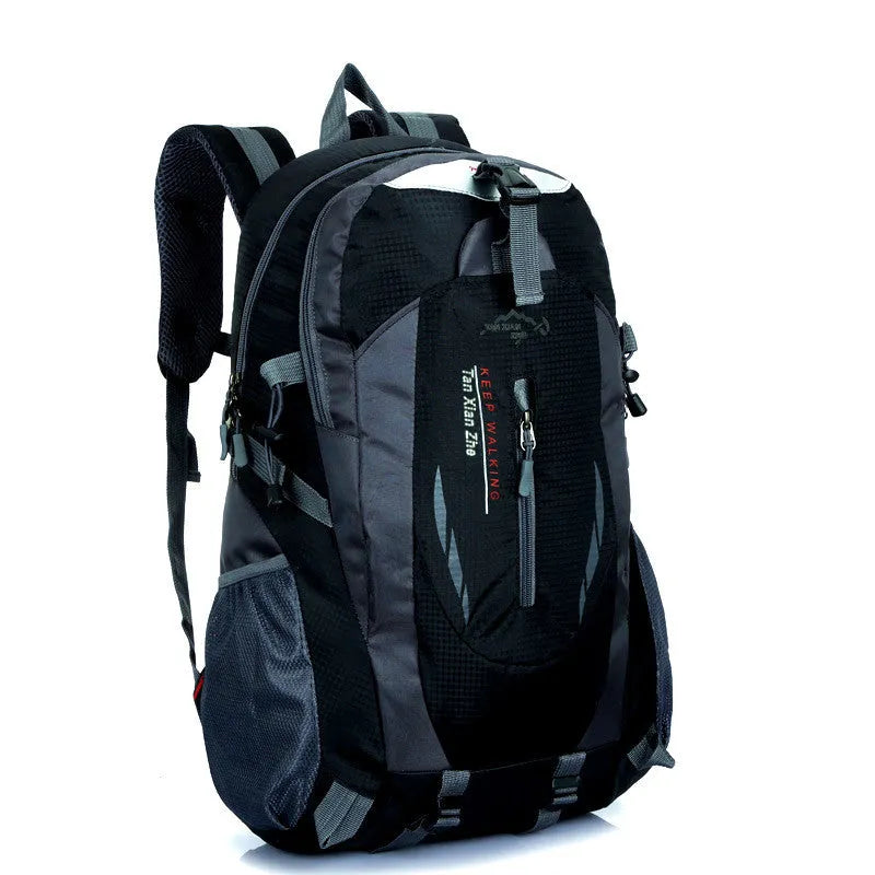 Large waterproof Oxford cloth travel backpack in red showing laptop pocket and double shoulder straps