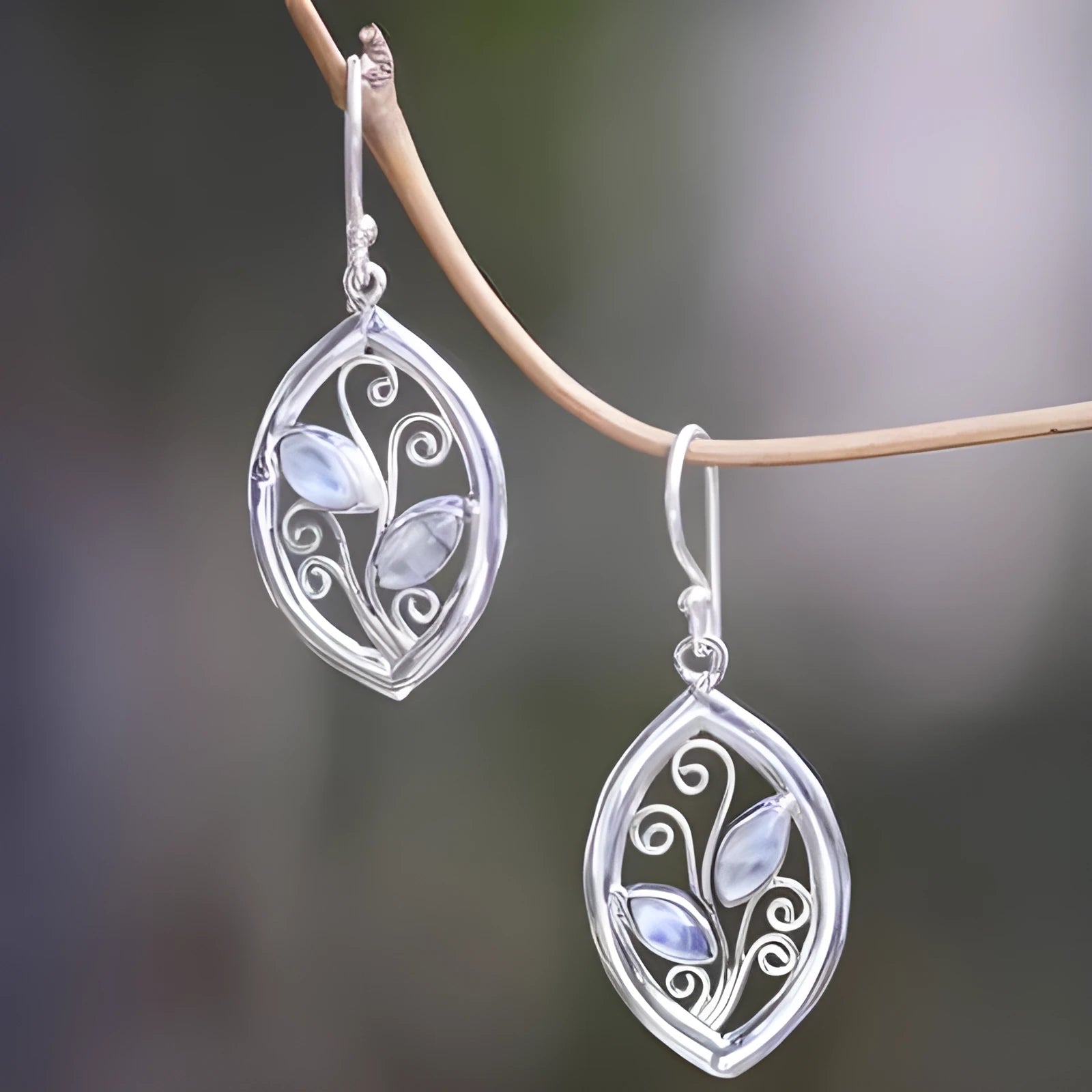Women's silver-colour leaf earrings with colourful embedded moonstones in drop style