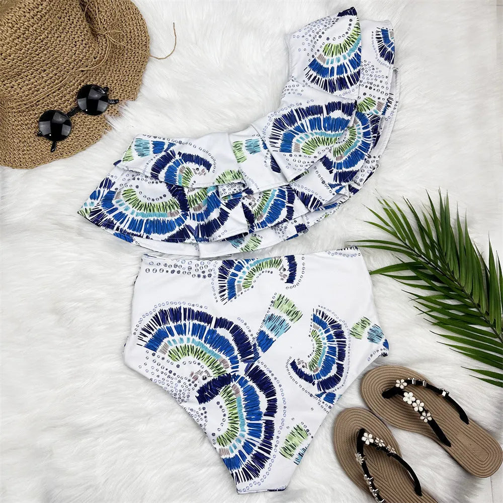 White women's one-shoulder swimsuit with a textured large lotus leaf design and double-layer construction.