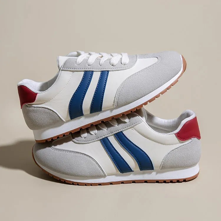 Blue and grey Cortez stripes leisure sports shoes with rubber sole and round toe.