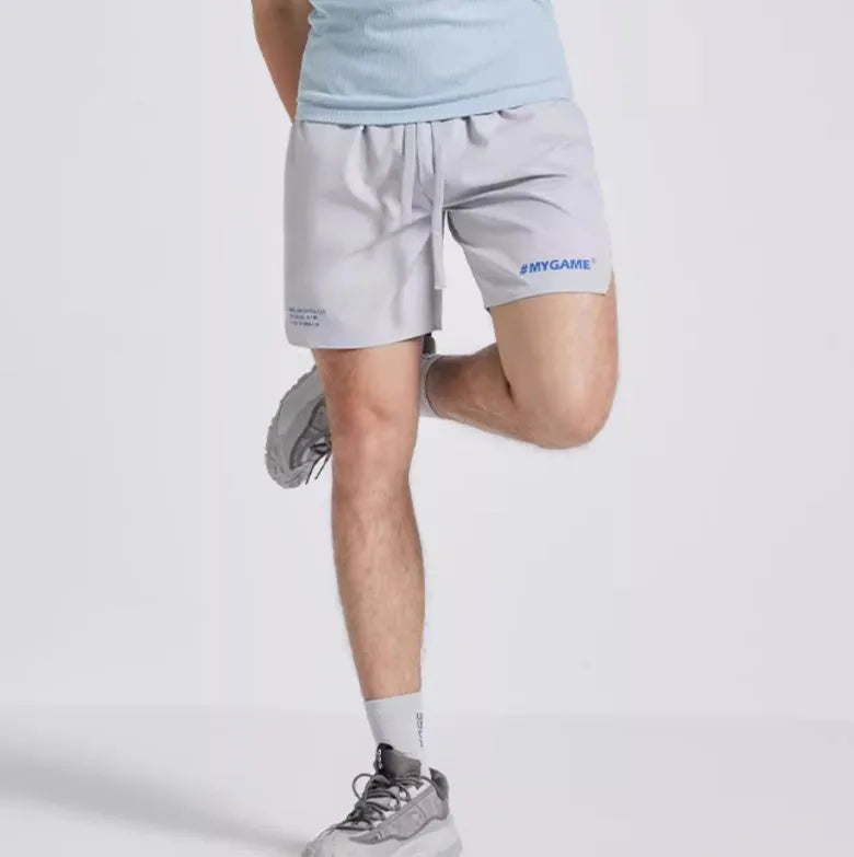 Men's training fitness shorts in blue, black, grey, or white with moisture-wicking fabric.