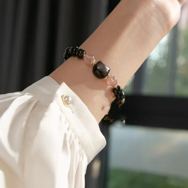 Natural obsidian bracelet with 8mm black beads and kitty charm on adjustable string